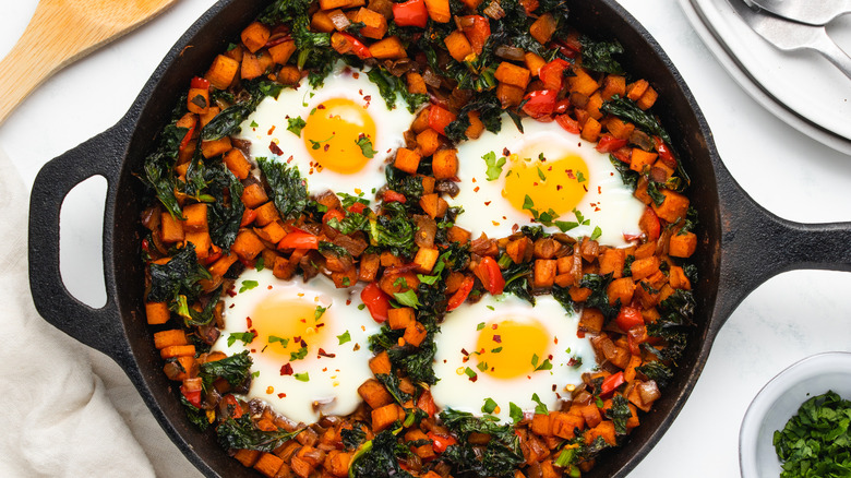 Kale and sweet potato hash in skillet