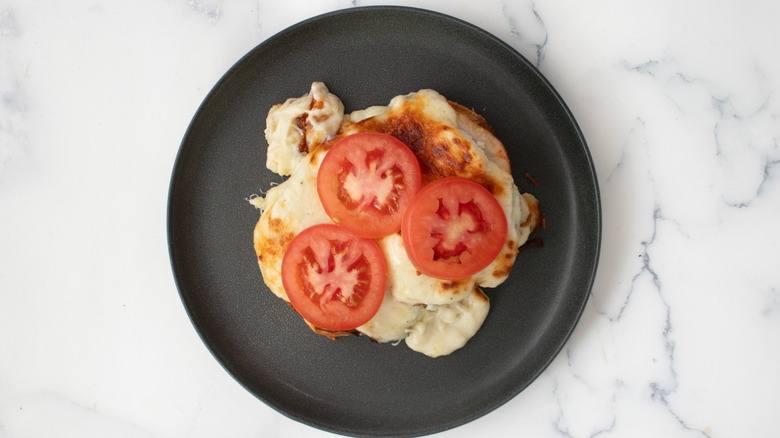 Hot Brown sandwich with tomato slices