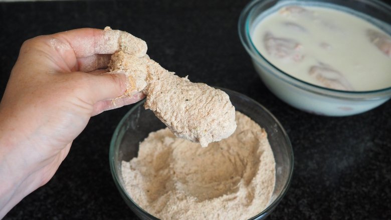 dredging chicken in flour