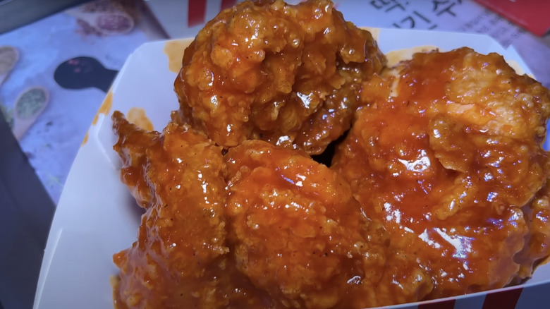 Basket of fried chicken with God sauce KFC Korea