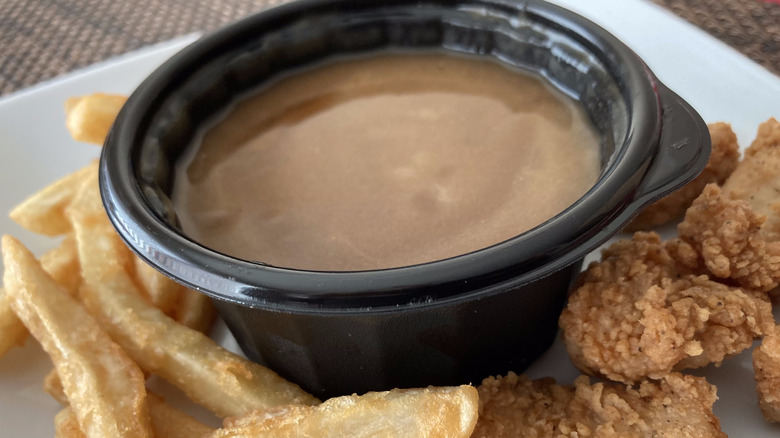 KFC gravy with fries and nuggets