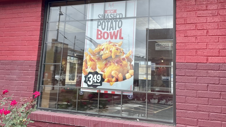 Window with KFC ad