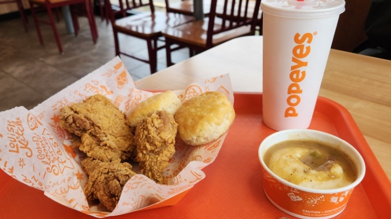 Popeyes 3-piece combo with chicken biscuits mashed potatoes soft drink