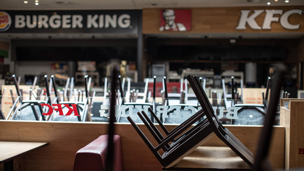 Chairs stacked in closed food court