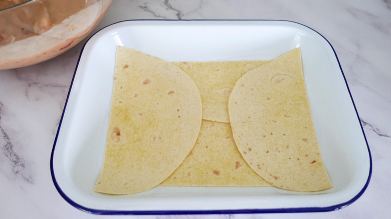 tortillas in casserole dish 