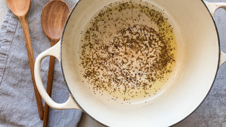 cumin seeds toasting in pot