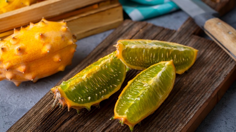 Sliced and whole kiwano melons