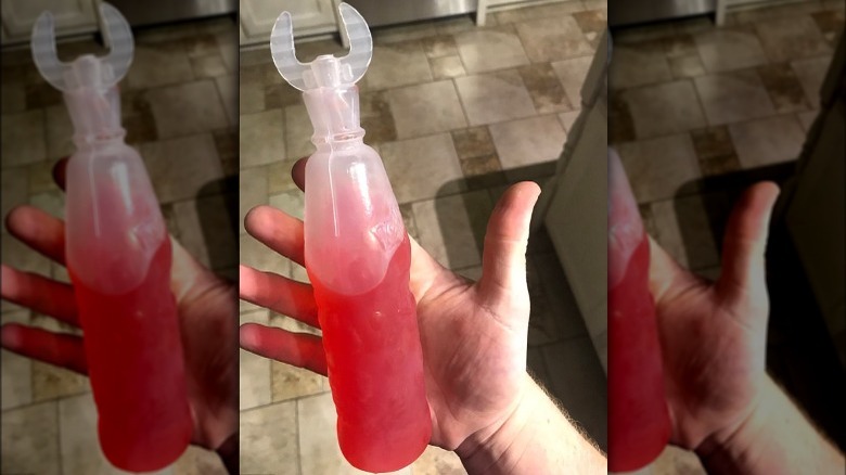 Kool-Aid Burst cap sealing bottle