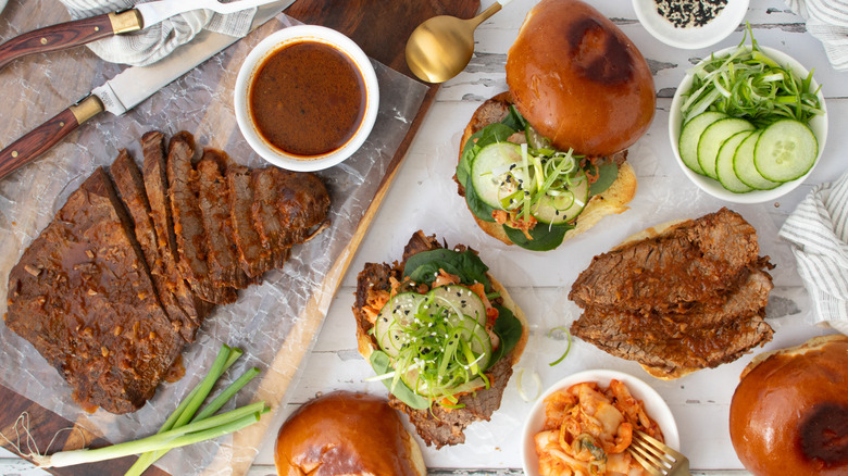 bulgogi bbq brisket sandwich with garnishes