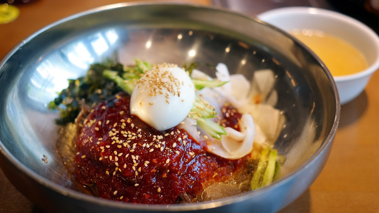 Bibim naengmyeon in metal bowl