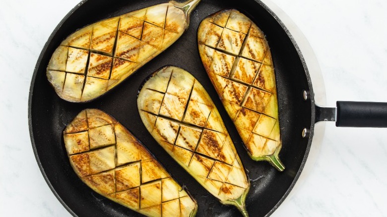 seared eggplant with score marks