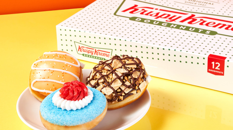 Donuts on a plate and Krispy Kreme box