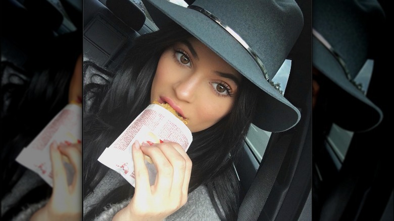 Kylie Jenner eating McDonald's hashbrown