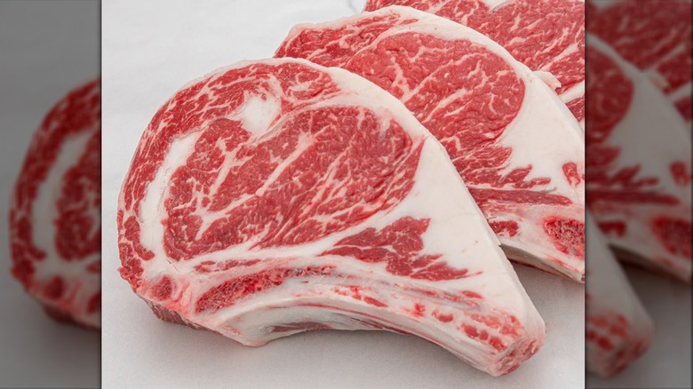 Raw ribeye steaks