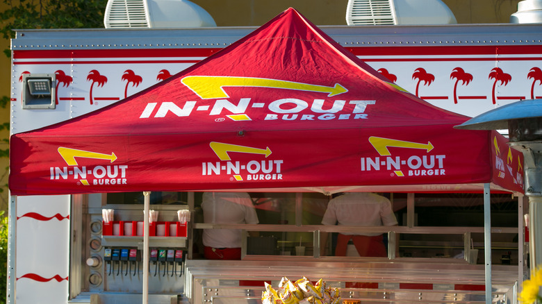 in-n-out truck with people working