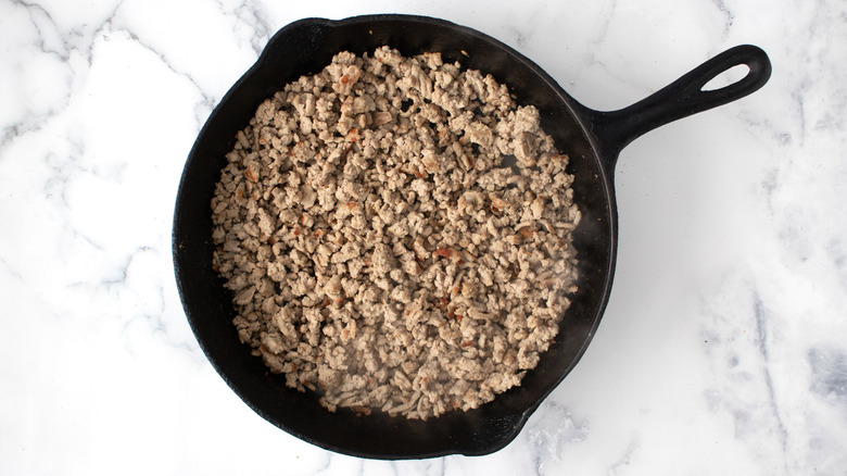 browning ground chicken in skillet