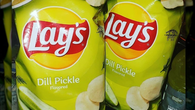 two bags of Lay's dill pickle chips