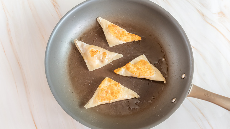 pan-frying pierogis