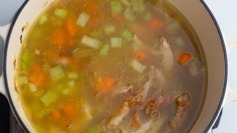 chicken soup in a pot