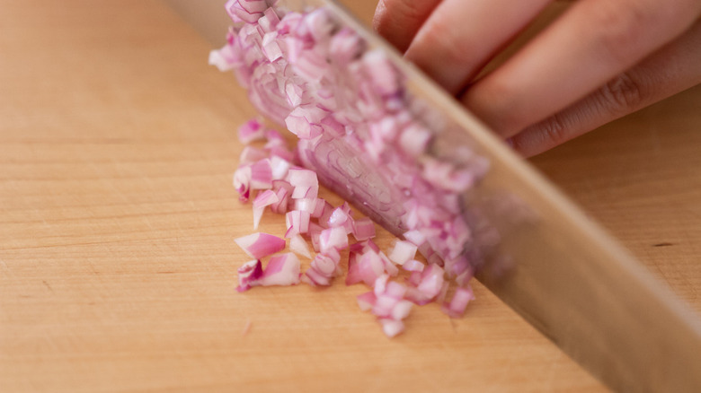 shallot on cutting board 