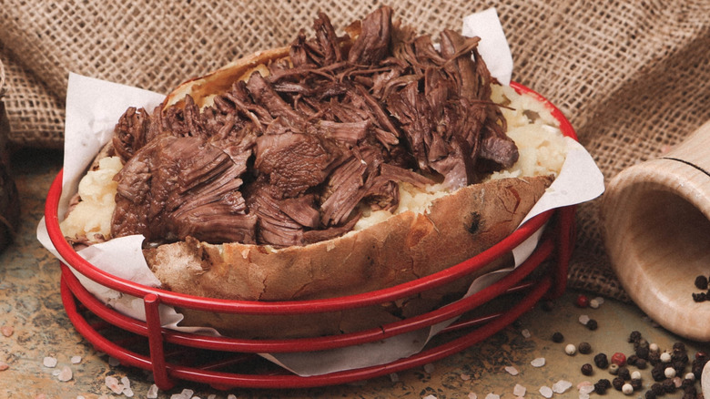 shredded beef on baked potato