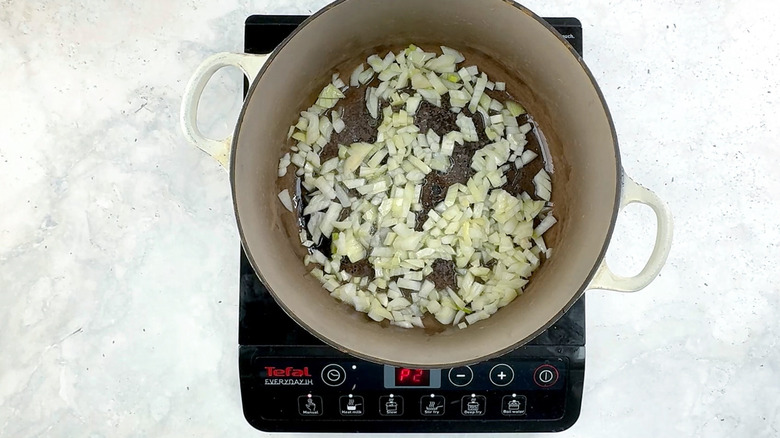 onion sauteeing in pan