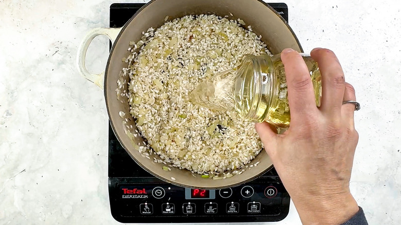 adding wine to rice