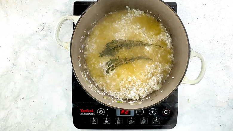 thyme sprigs in risotto