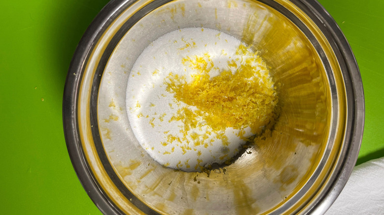 Lemon zest and sugar in bowl