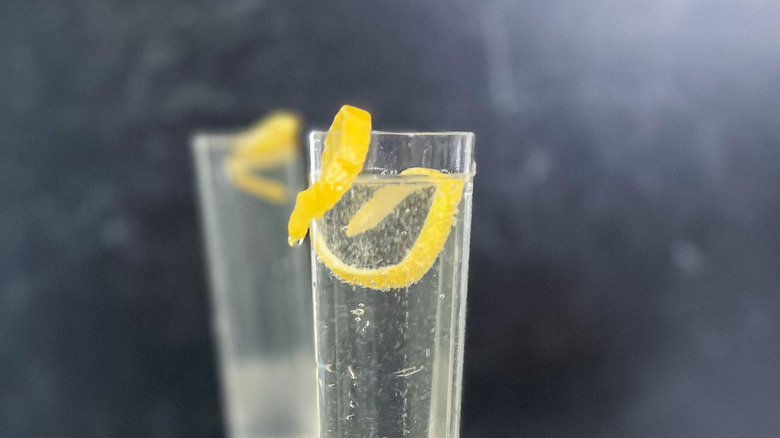 cocktails with garnishes of lemon
