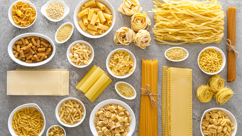 varieties of pasta in white bowls