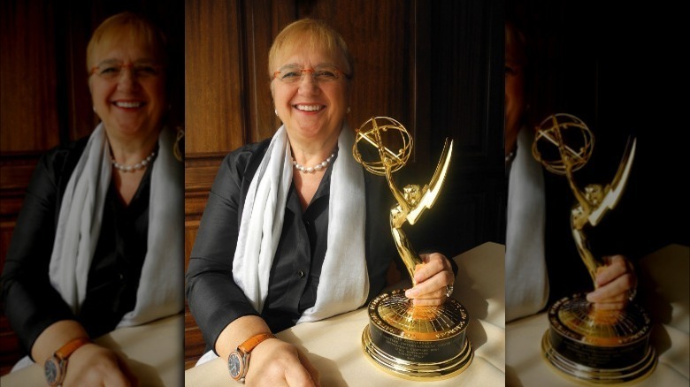 Lidia Bastianich holding emmy award