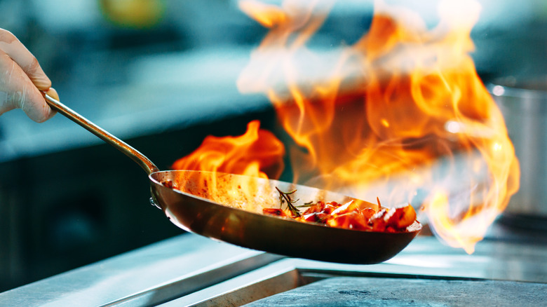 flambé flame on pan