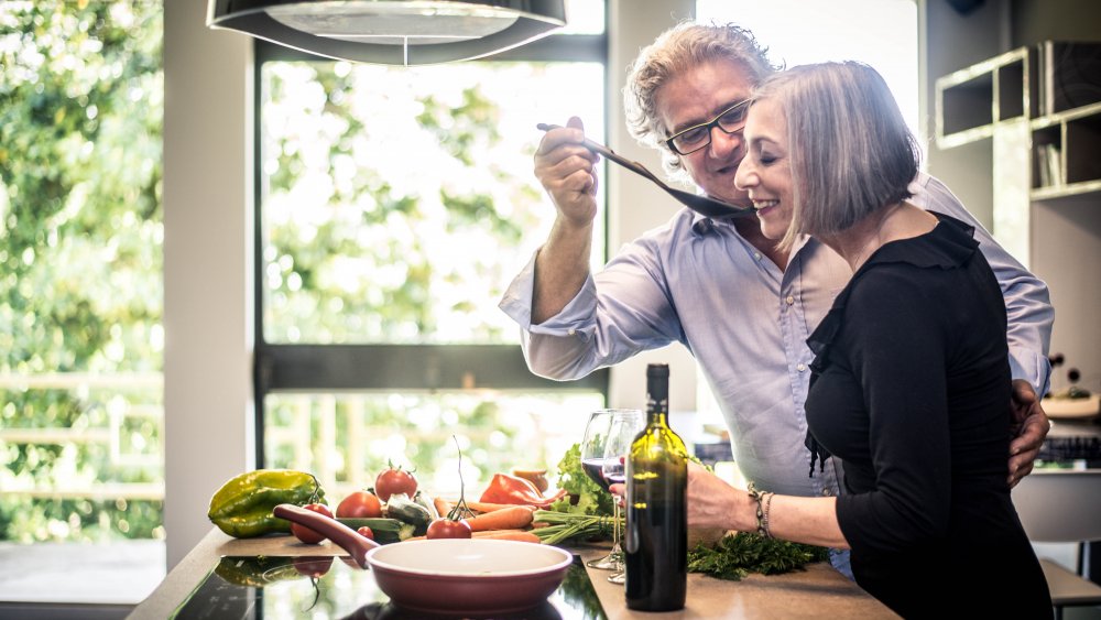 Cooking Rachael Ray's red wine rice with grapes