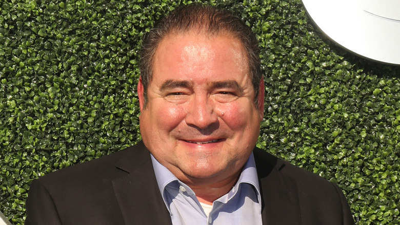 Emeril Lagasse posing outside