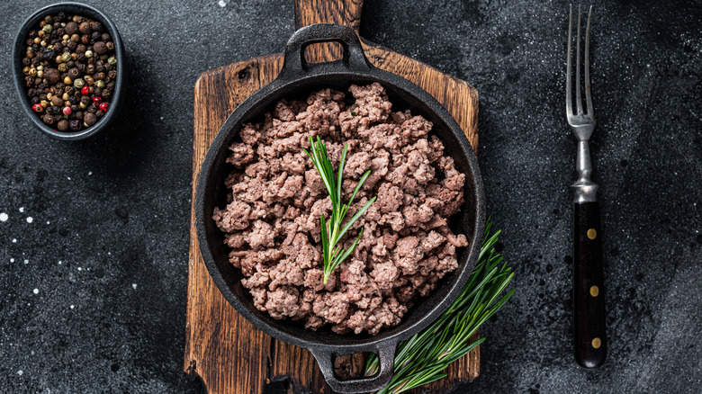 browned ground beef in pan