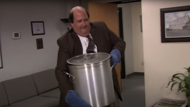 Brian Baumgartner holding chili pot in The Office