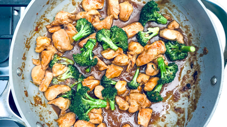 chicken and broccoli in pan