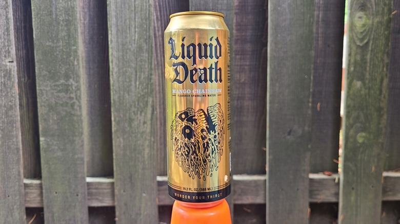 can of liquid death mango chainsaw