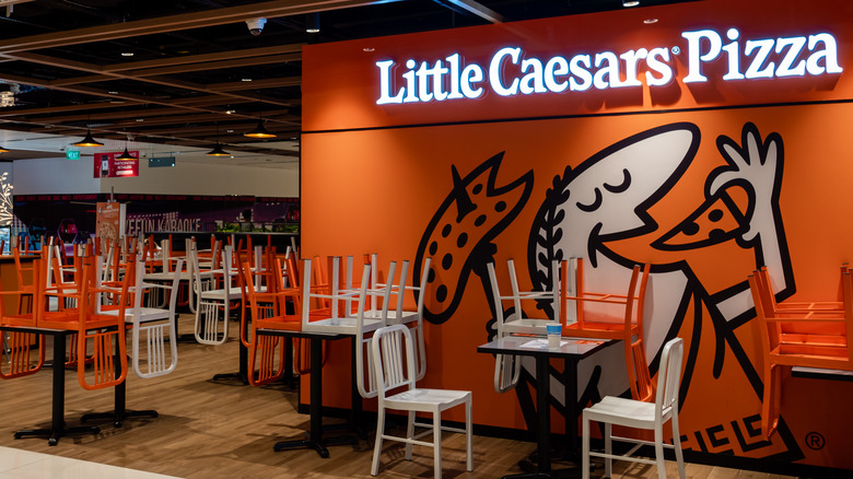 Little Caesars restaurant chairs on tables