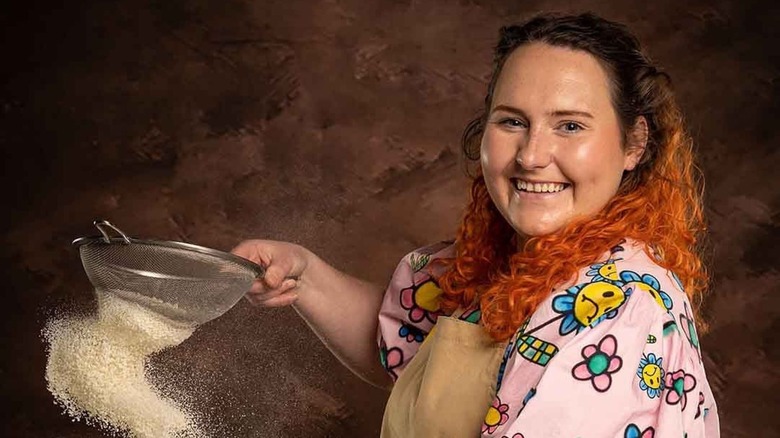 Lizzie Acker with white flour