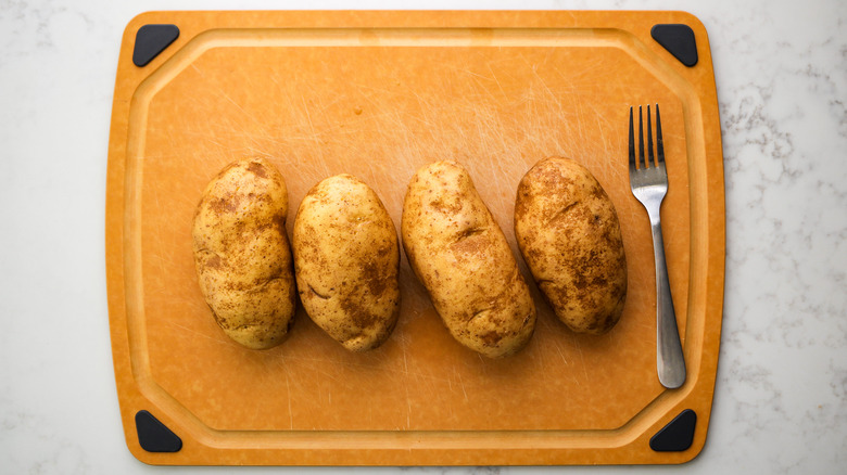 potatoes on cutting board