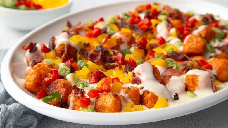 loaded tater tots on plate