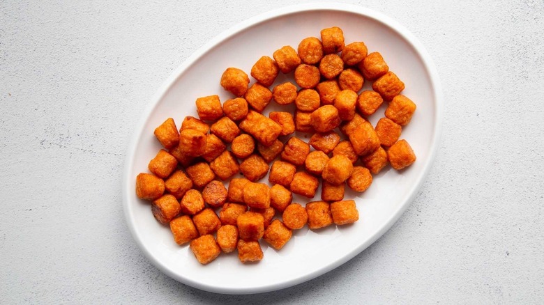 tater tots on white plate