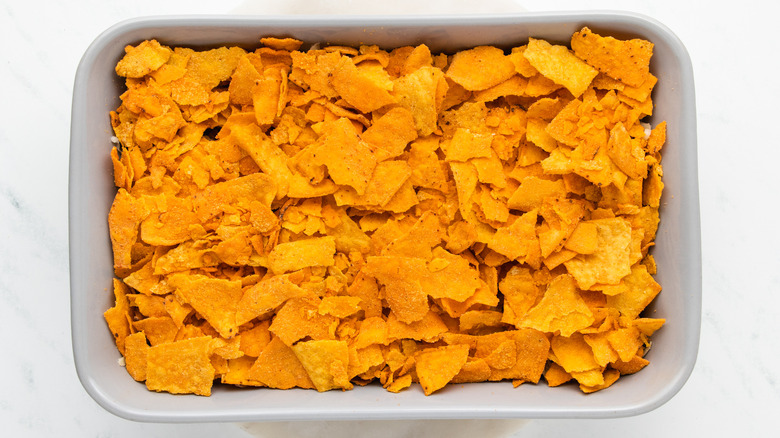 Dorito-topped taco casserole in baking dish