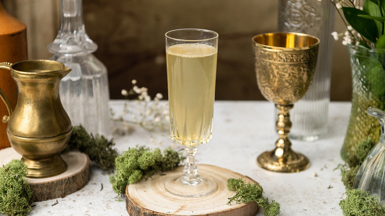 yellow cocktail in stemmed glass