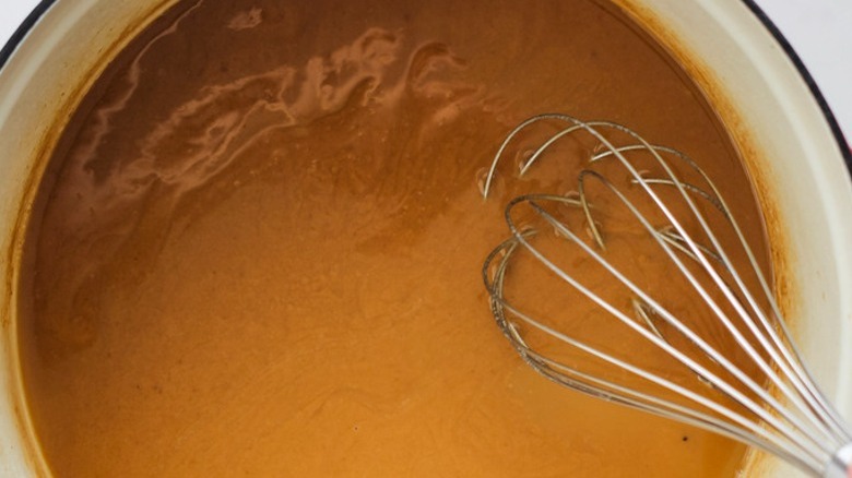 roux in pot with whisk