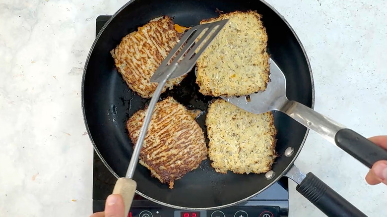 flipping cauliflower sandwiches