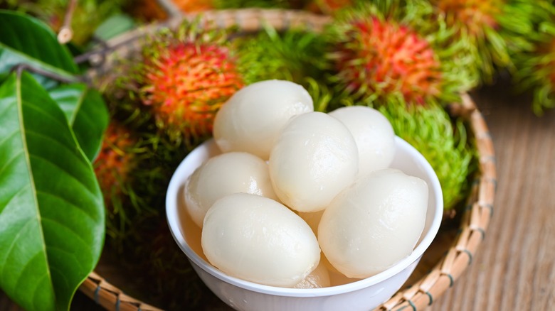 peeled rambutan white dish