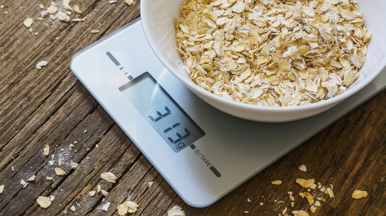 kitchen scale with bowl of oats